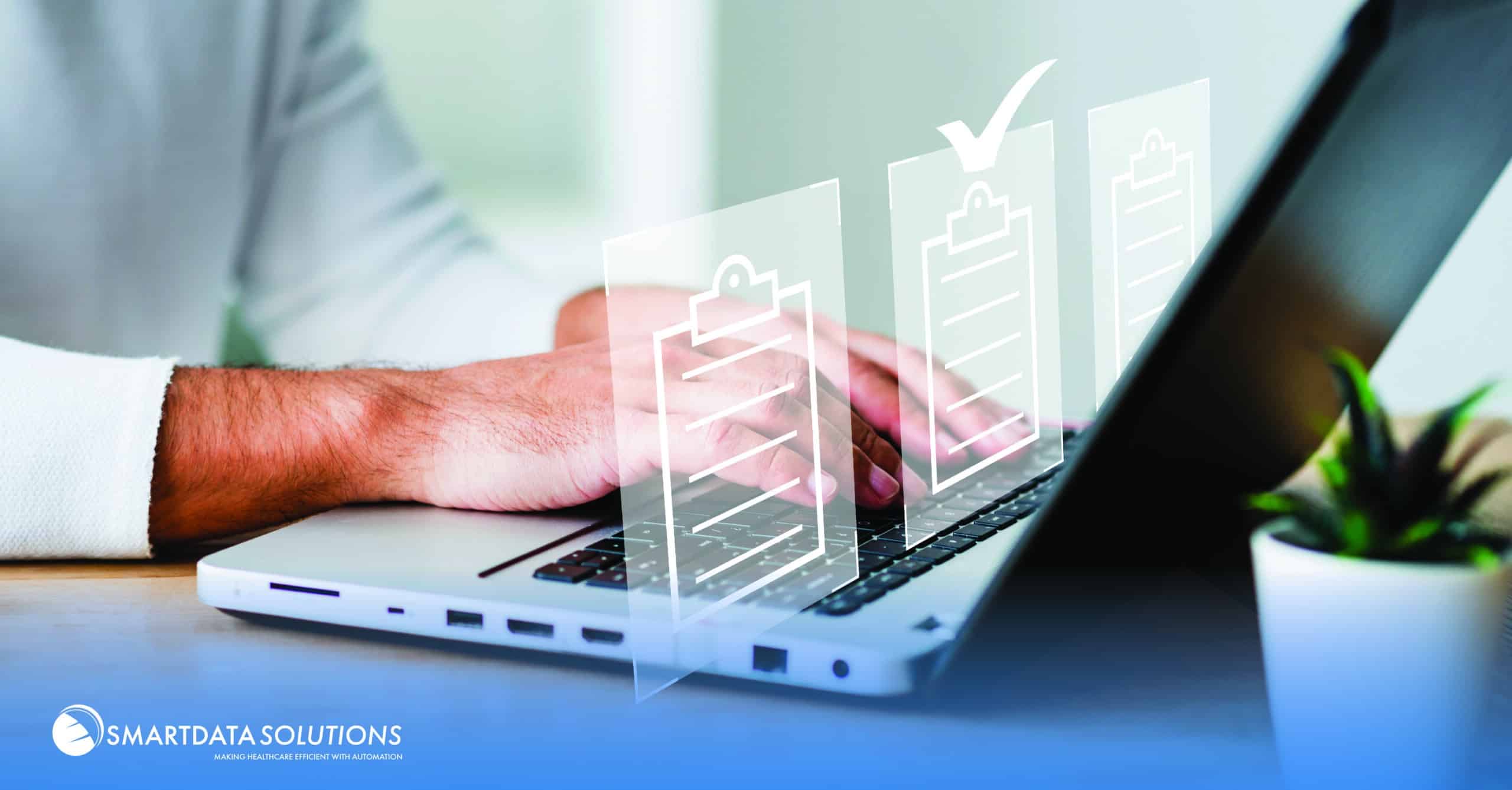Document icons with a checkmark floating over a laptop keyboard, representing prior authorization automation